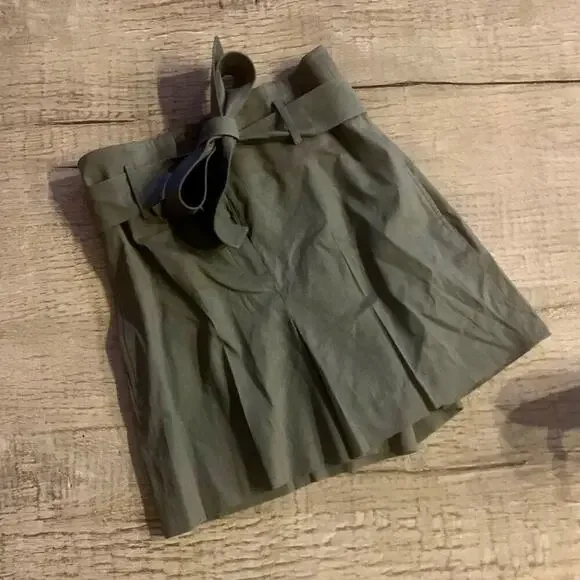 Theory Eco Crunch Belt Shorts in Thyme.